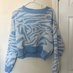 Blue and white sweater